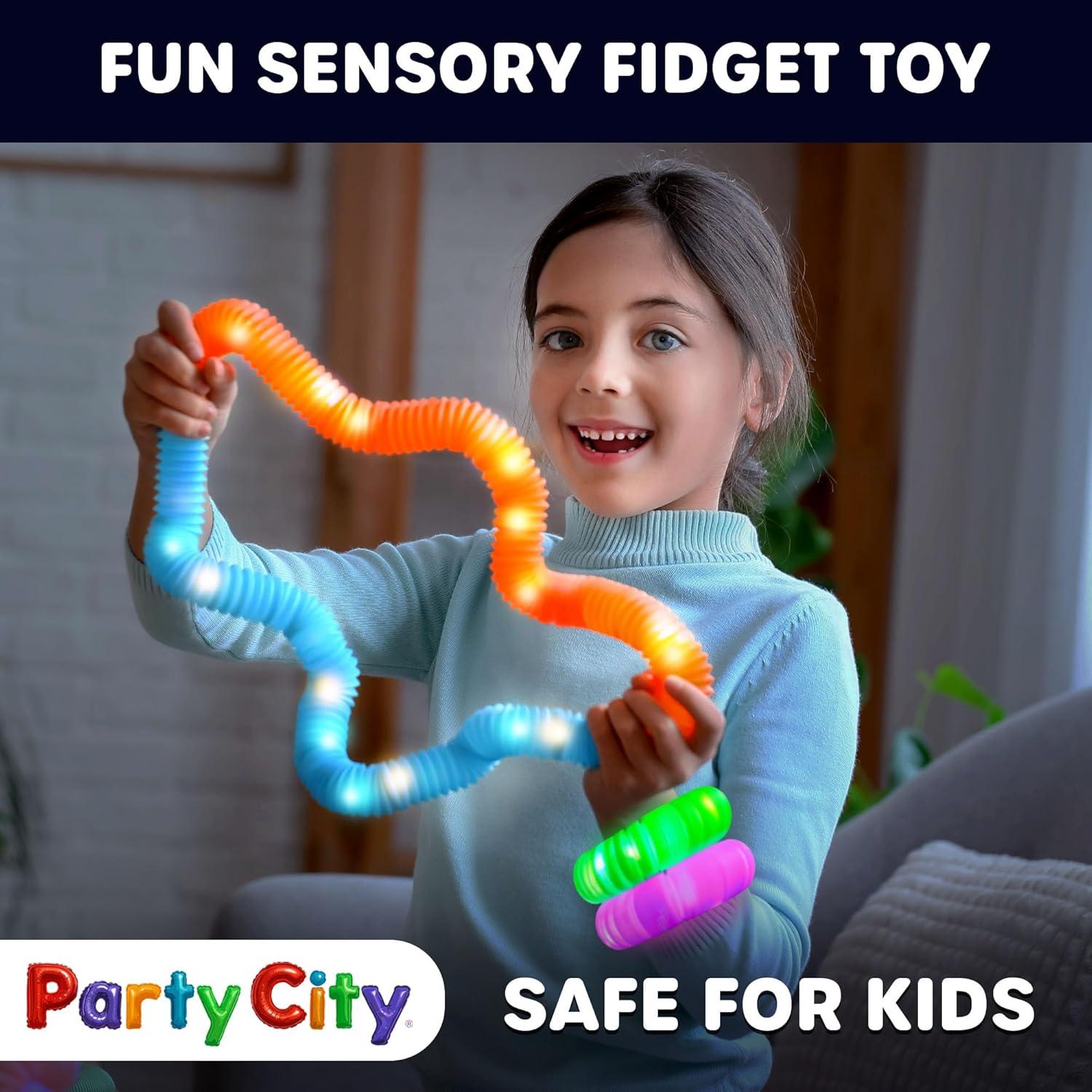 imageParty City 12pk LED Light Up Pop Tubes 25 3 Mode Stretchy Tubes LED Light Up Toys Bulk Glow Sticks Party Favors for Kids Necklaces Bracelets Neon Glow in the Dark Supplies Fidget Sensory Tube Pack12 pcs Glow Pop Tubes